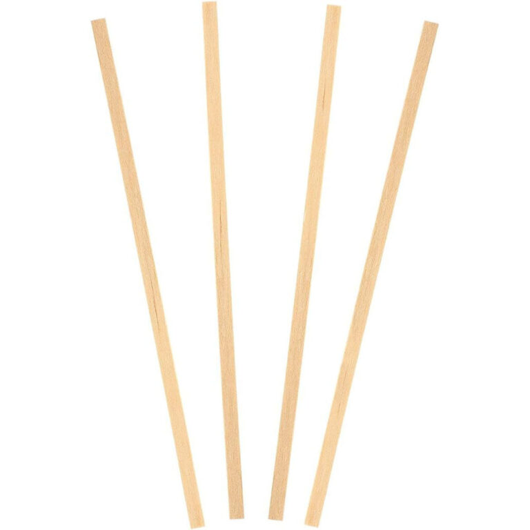 Flat-ended disposable bamboo coffee stirrers fanned out on a white background