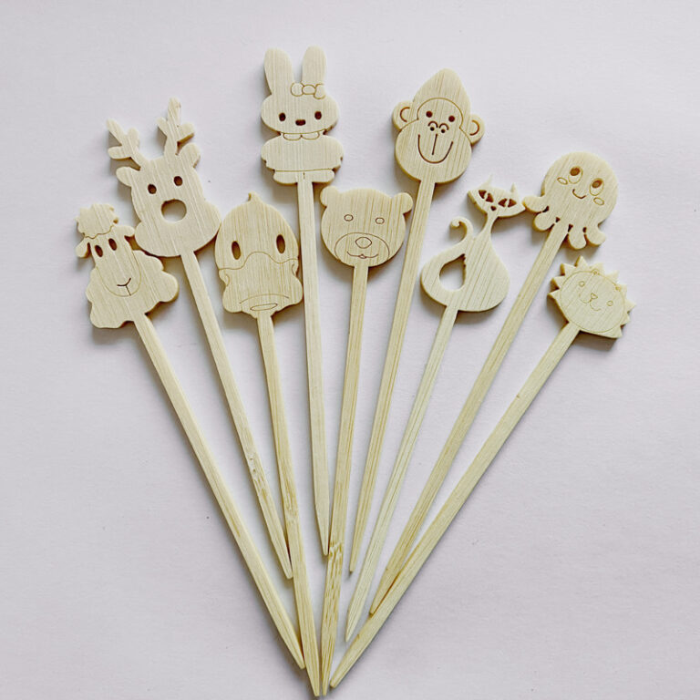 Shaped disposable bamboo coffee stirrers with decorative rounded tops