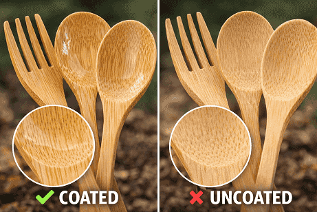Close-up of bamboo cutlery showing coated vs uncoated surface comparison