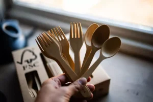 Compostable-birchwood-disposable-forks-and-spoons-displayed-as-sustainable-plastic-free-alternative-for-World-Cup-foodservice